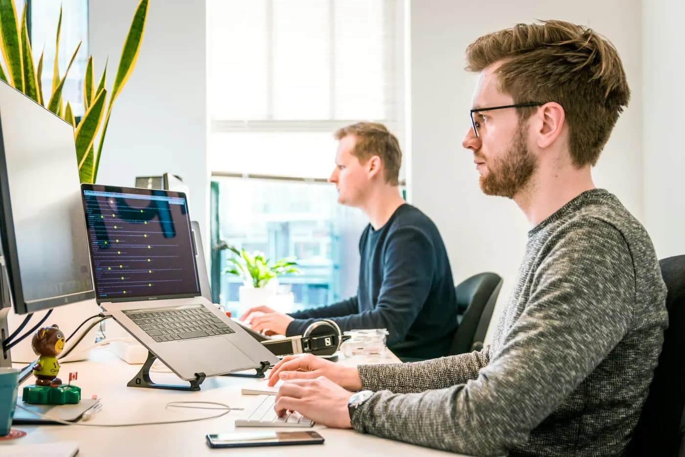 Engineers working together at their desks